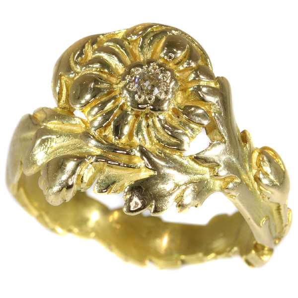 Late Victorian early Art Nouveau flower ring with natural fancy color diamond